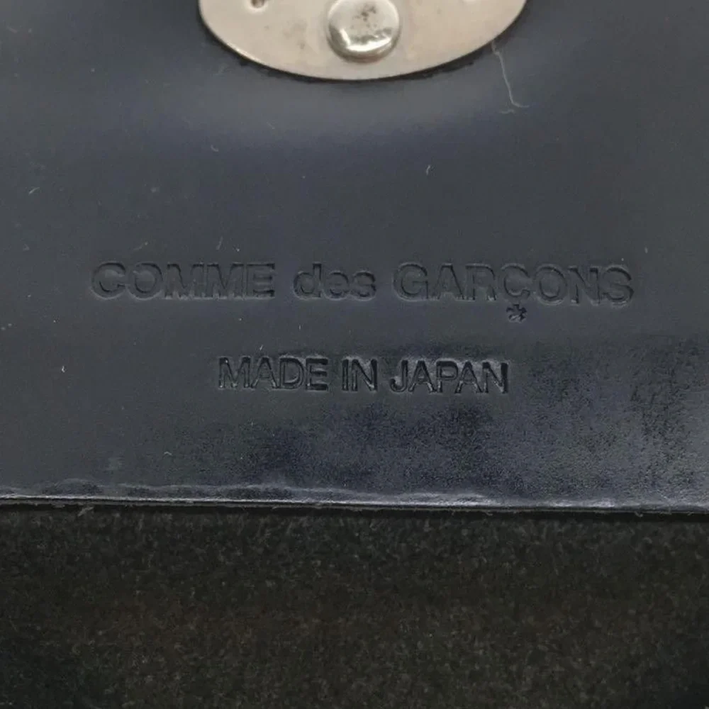 Comme des Garcon studded leather wallet card holder